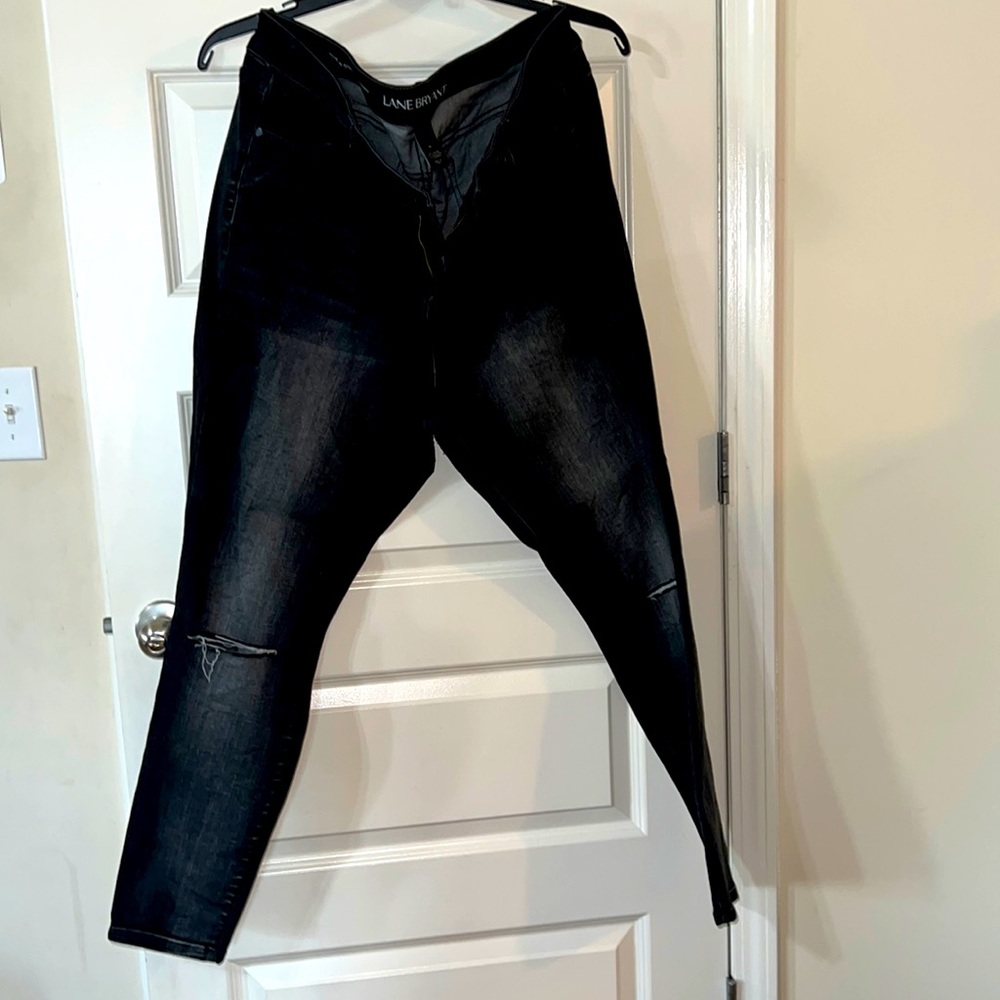 Black with gray wash skinny jean with kne slits from Lane Bryant. Gently used